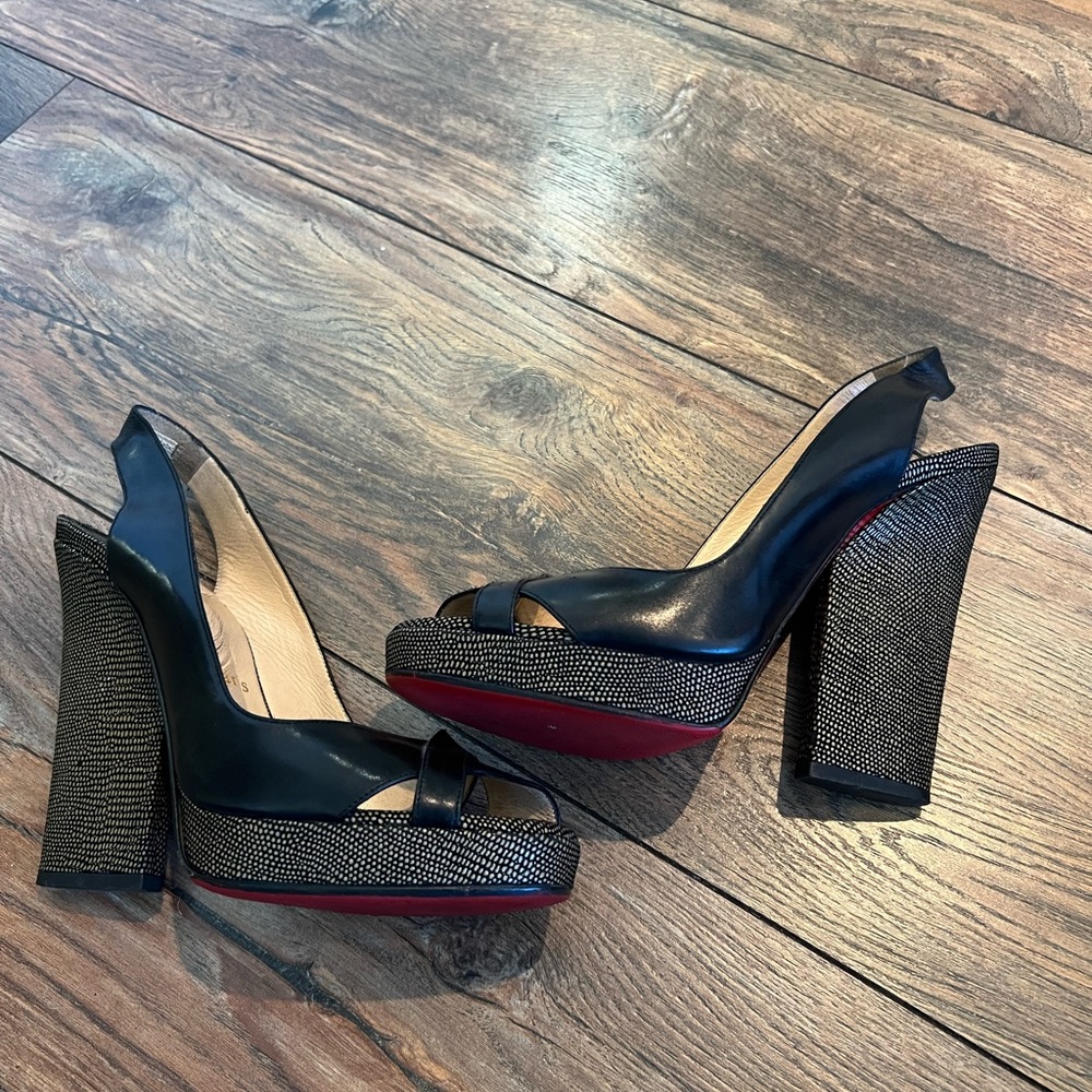 Gorgeous classic versatile Christian Louboutin peeptoe sling back platform heel.
